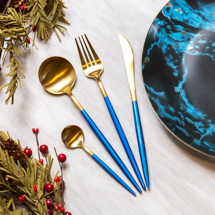 https://cutesyhome.com/cdn/shop/products/dual-color-stainless-steel-cutlery-set-blue-16-piece-129.jpg?v=1655628069&width=750