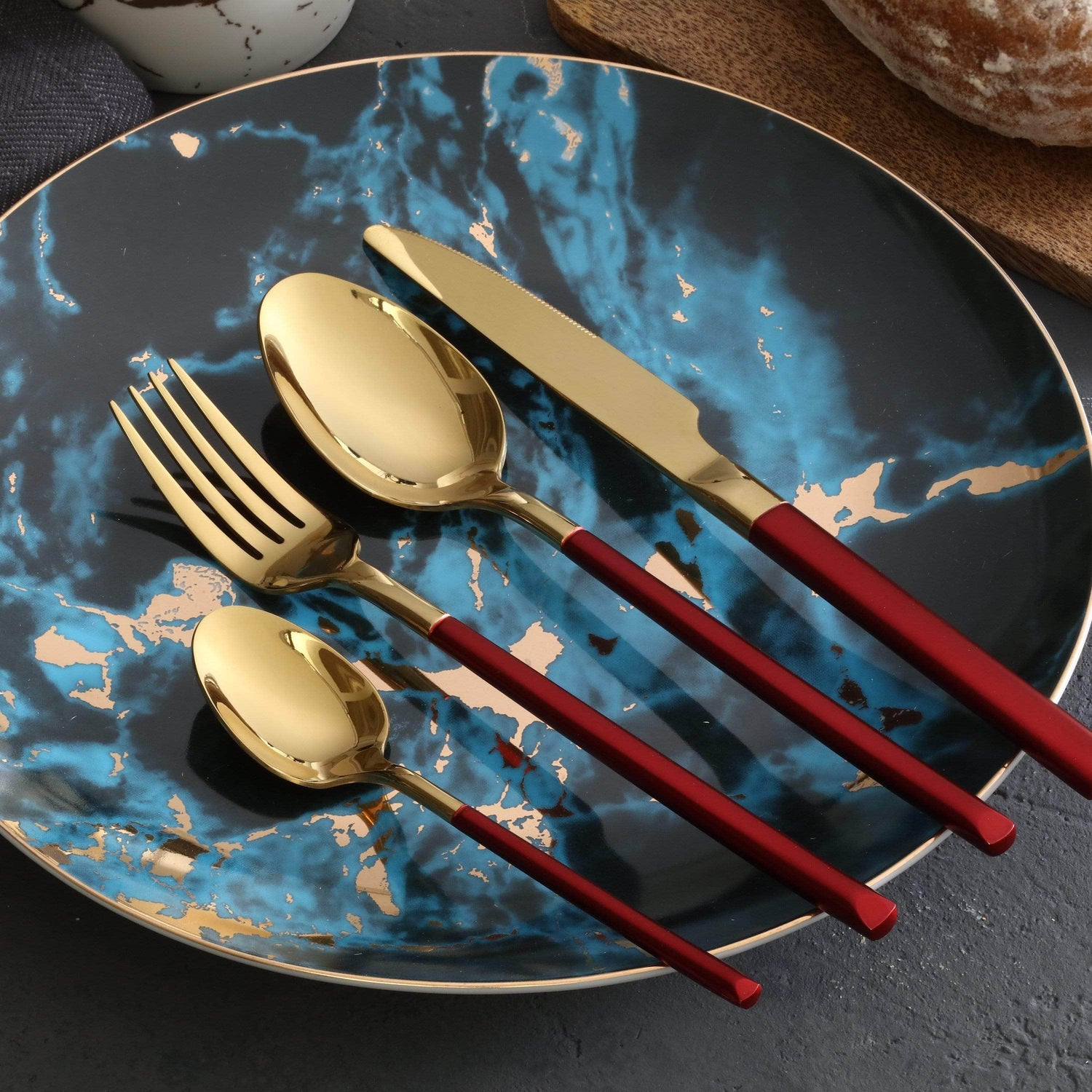 https://cutesyhome.com/cdn/shop/products/dual-tone-gold-finish-cutlery-set-red-407.jpg?v=1655627689&width=1500