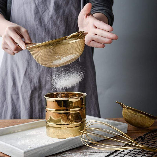 https://cutesyhome.com/cdn/shop/products/golden-finish-stainless-steel-sieve-strainer-baking-pastry-tools-499.jpg?v=1655627547&width=550